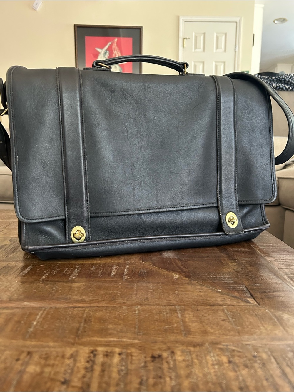 Coach Black Leather Messenger Bag with Gold Hardware